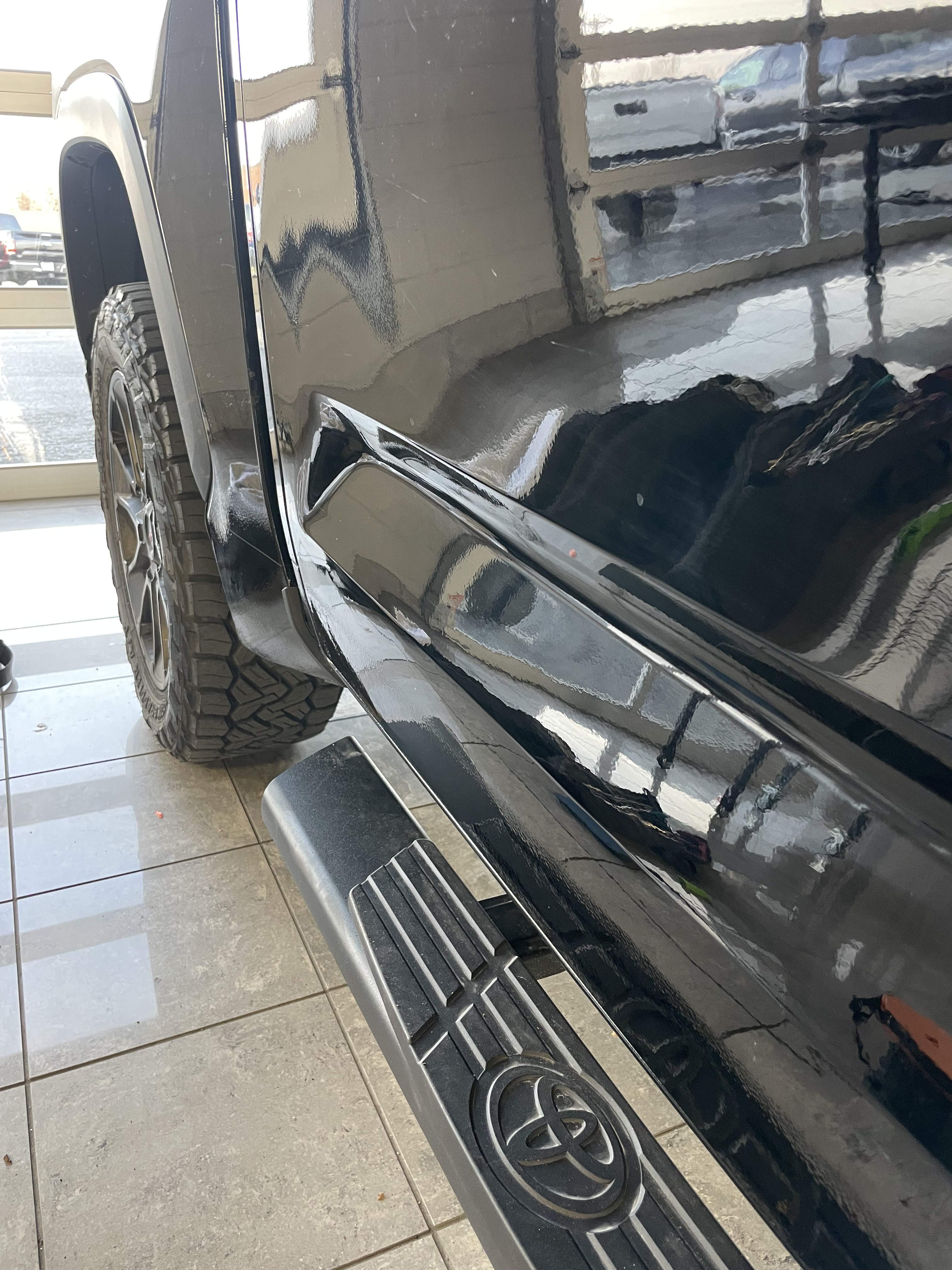 the toyota with the rear door fixed completely